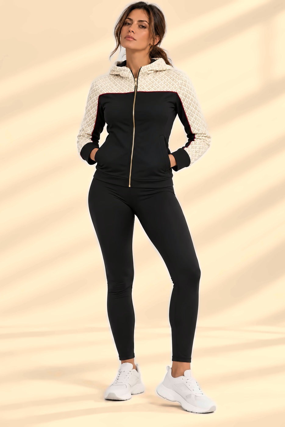 Yoke Giacca Sportiva con leggings neri e sneakers bianche, figura intera in uno studio luminoso.